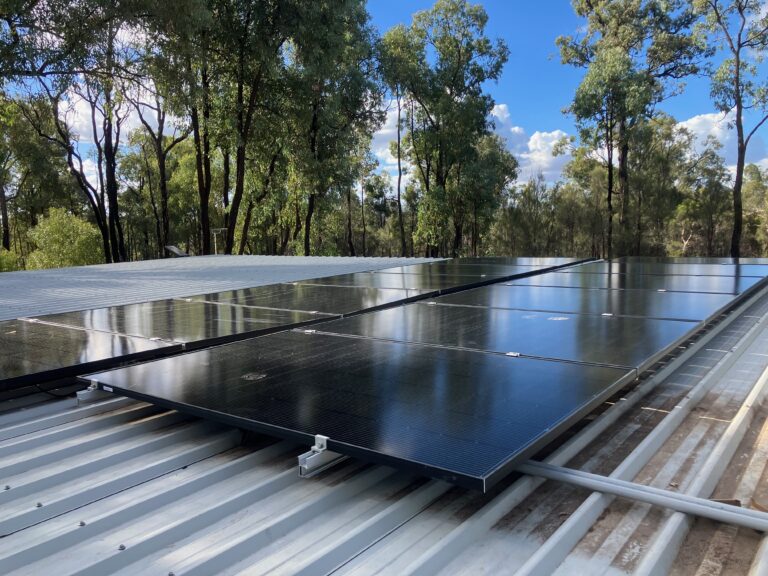 Rooftop solar panels installed on a metal roof